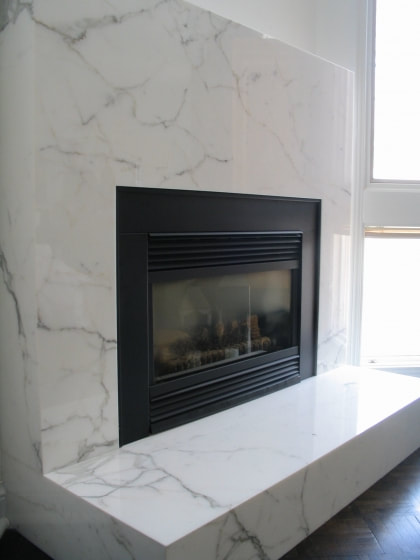 CARRARA MARBLE FIREPLACE